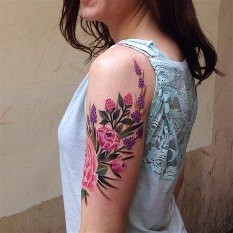 upper arm flower tattoo